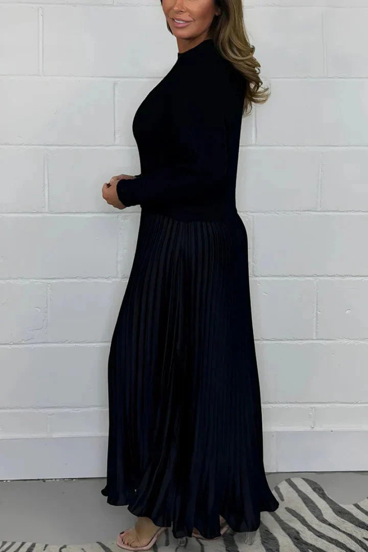 A high-quality women’s dress with a knitted top and a pleated skirt