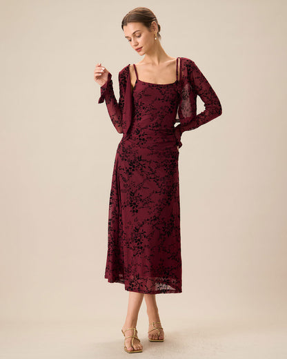 An elegant women’s fitted midi dress with straps and a floral pattern
