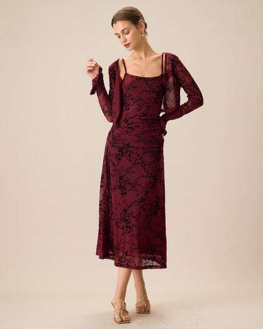 An elegant women’s fitted midi dress with straps and a floral pattern