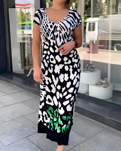 A casual women’s dress with a printed design and short sleeves