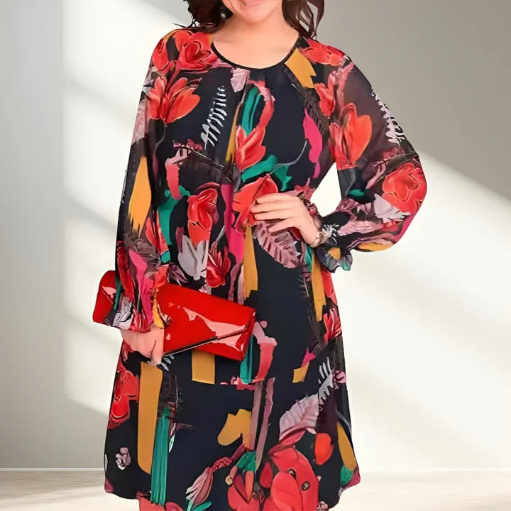 A light, flowy women’s floral dress with long sleeves and a relaxed fit