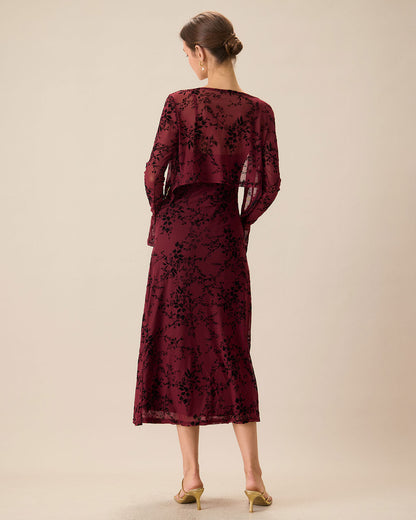 An elegant women’s fitted midi dress with straps and a floral pattern