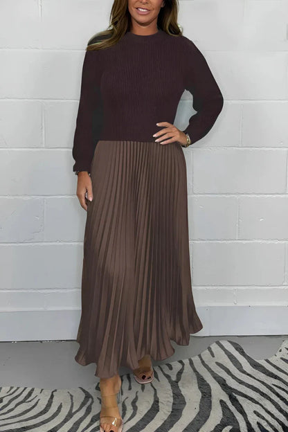 A high-quality women’s dress with a knitted top and a pleated skirt